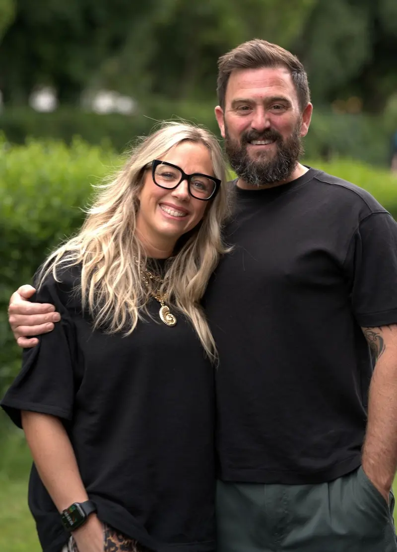 Kenny and Nicola McCoosh smiling together outdoors